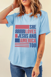 She Loves Jesus & America Too” Graphic Tee – Light Blue